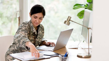 Woman veteran doing loan paperwork